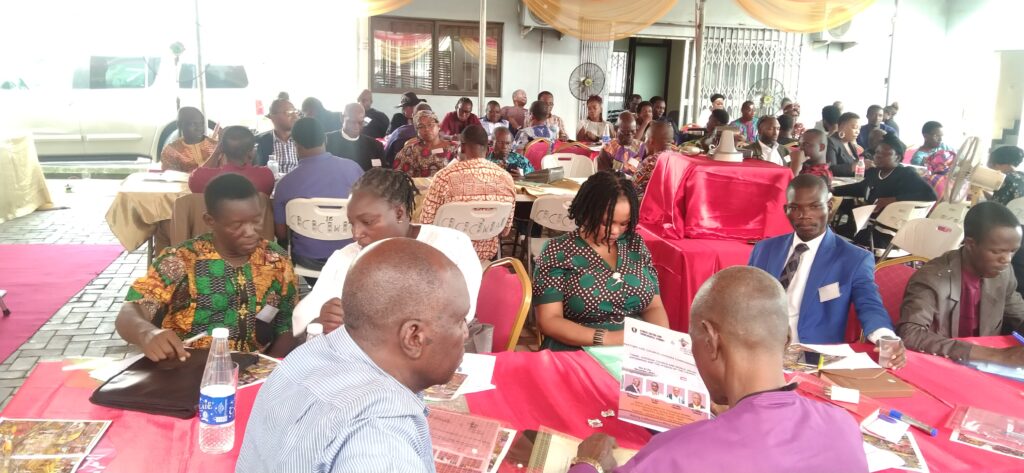 a group of people sitting at tables